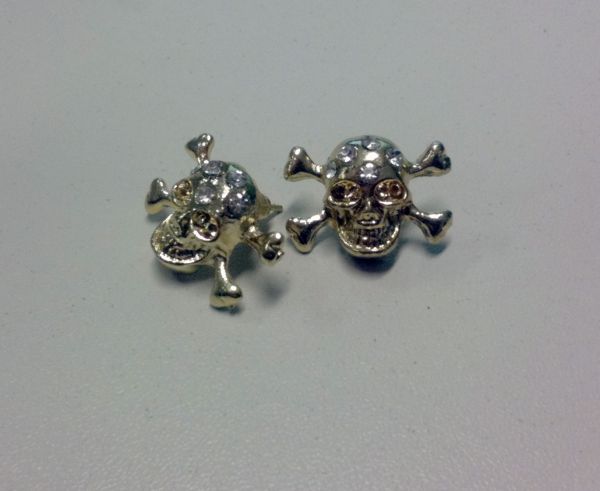 Brinco de caveiras + strass
